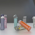 Different Colored Water Bottles With Flip Lids And Sleek Designs On