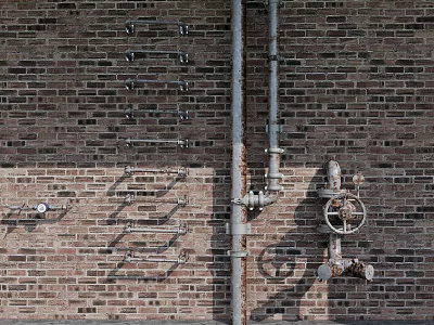 Industrial Pipes Mounted on Exposed Brick Wall with Valves and Metal Fittings 3d model