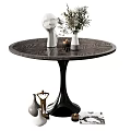 Round Wooden Dining Table with White Sculpture Green Plant Vase and Decorative Vases Gold Ornament