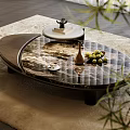 Modern Oval Coffee Table With Marble Top And Grapes Bowl On Living Room Rug