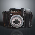 Vintage Camilla 2 Camera Electronic Device With Retro Design Black Body And Silver Lens