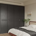 Dark Paneled Wardrobe with Brass Handles in Bedroom Featuring Potted Plant and Wall Art