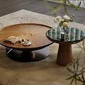 Modern Round Wooden Coffee Table With Flower Vase And Books On Carpet
