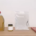 Spice Bottles Oil Container Small Jar And Red Cloth On Wooden Tabletop With White Wall