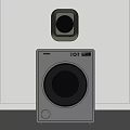 Green Wall Mounted and Gray Front Load Washing Machines on Wall and Floor