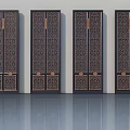 Traditional Chinese Hinged Doors With Intricate Carved Patterns And Bronze Accents