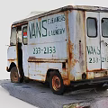 Old Rusty VANS Truck with Worn Out Body and Vintage Exterior