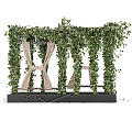 Lush Vertical Living Plant Wall Design With Green Vines And Metal Frame Planters