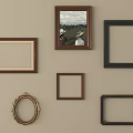 Wall Frames Display With Various Shapes Colors And Artwork Of People In Field