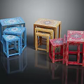 Colorful Patterned Stools in Blue Yellow Red Stacked for Home Decor