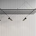 Modern Linear Pendant Light With Black Metal Structure And Cone Shades For Interior Design