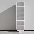 White Vertical Bookshelf With Multiple Shelves Standing Against Wall In Modern Design 3d model