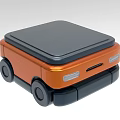 Orange And Black Industrial Equipment With Mobile Wheels And Compact Black Top Design