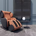 Modern Brown Black Massage Chair Interior With Gray Wall Small Table And White Spherical Lamp
