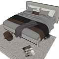 Modern Double Bed With Upholstered Headboard Soft Pillows Layered Blankets And Area Rug