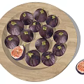 Fresh Purple Figs Arranged in Wooden Bowl with Halved Fig