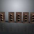 Brown Control Panels With Three Circular Buttons Each Arranged On Grey Reflective Surface