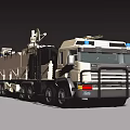 Beige Military Utility Truck Featuring Large Tank Mounted Equipment Blue Lights And Multiple Wheels