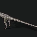 Realistic Green And Red Dinosaur Model With Open Mouth On Black Background