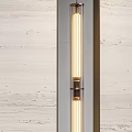 Modern Vertical Wall Lamp With Warm Light On Textured Interior Wall 3d model