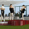 Two Person Dance Poses On Red And White Platform In Green Grass Field With Canopy