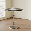 Dark Top Side Table with Silver Base Holding White Cup and Books by Shutter Window 3d model