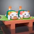 Cartoon Cat Dolls In Different Colored Clothes Lying On Green Leaves Over Orange Small Table