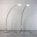 Contemporary Silver Curved Floor Lamp With Sturdy Base And Metallic Finish