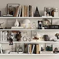 Stylish Ornament and Decor Combination With Books Sculptures Lamps And Frames On Shelves
