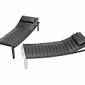 Black Leather Lounge Chair With Modern Striped Design Backrest And Colored Legs