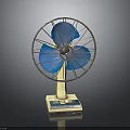 Tabletop Electric Fan With Blue Blades Metal Grill And Stable Base Design