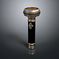 Vintage Gold And Black Decorative Metal Object With Ornate Top And Base