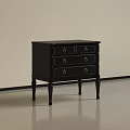Black Modern Dresser With Three Drawers And Gold Handles On Slim Legs