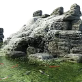 Outdoor Garden Ornaments With Decorative Stone Stacked Structures And Green Bases