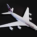 Qatar Airlines Passenger Airplane With White Body Four Engines And Red Tail Design