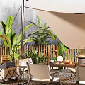 Outdoor Canopy Tent in Garden with Lush Plants Wooden Table Chairs and Food Drinks