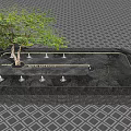 Outdoor Water Fountain Design With Central Tree And Diamond Patterned Floor Surrounded By Geometric Paving