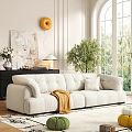 Modern Beige Fabric Sofa Coffee Table Set With Green Plant And Decorative Art