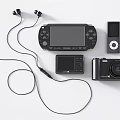 Modern Portable Entertainment Electronics Featuring Headphones Game Console MP3 Player And Digital Camera