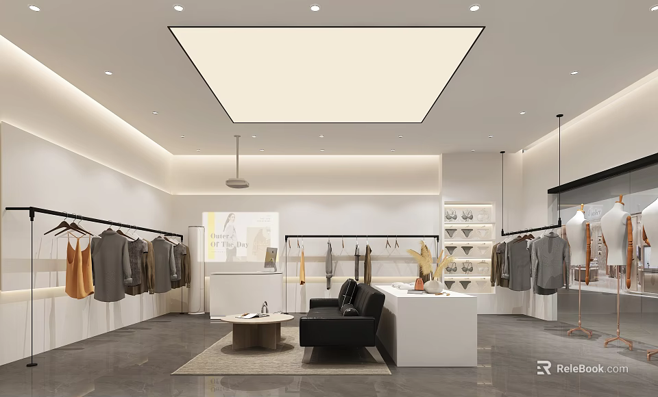 Modern Clothing Store Interior With Clothes Racks Sofa And Display Table 3d model