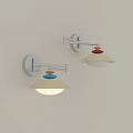 Modern Wall Mounted Lamps With Colorful Disc Accents And Cream Shades