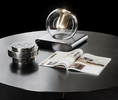 Decorative Ornament Set With Glass Ornament Silver Box And Open Magazine On Black Table 3d model