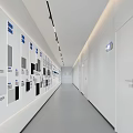 Office Corridor With White Walls Display Panels Color Samples Ceiling Light Strips And Gray Flooring