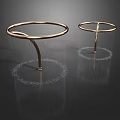 Shiny Golden Circular Garden Ornaments With Curved Stands And Decorative Bead Accents
