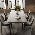 Modern Dining Table Set With Six Grey Chairs Floral Centerpiece And Fireplace
