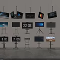 Multiple TVs Hanging And On Stands With Time Displays Scenic Views And Interfaces