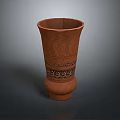 Intricately Carved Brown Clay Vase Sculpture With Decorative Patterns