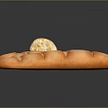 Display of Fresh Baguette Bread with Golden Crust Striped Texture Bitten Piece and Scattered Crumbs