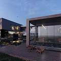 Modern Detached Villa With Glass Facade Water Pool Outdoor Lawn And Sunset Sky