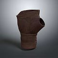 Brown Leather Gauntlet Featuring Carved Pattern And Handcrafted Strap Design